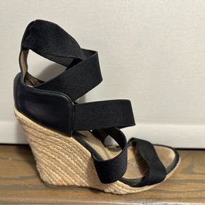 Club Monaco criss cross espadrilles w leather detail.